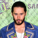 Leto, draped in the skin of his enemies' couches at the Suicide Squad premiere (Photo: James Devaney/ Getty Images)